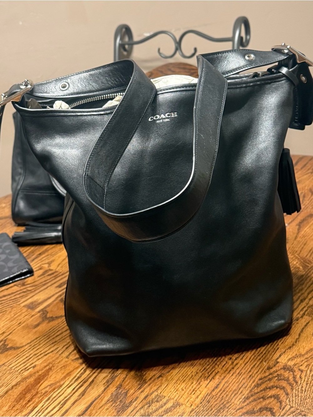 Coach Black Leather Shoulder Tote with Silver Logo and tassles